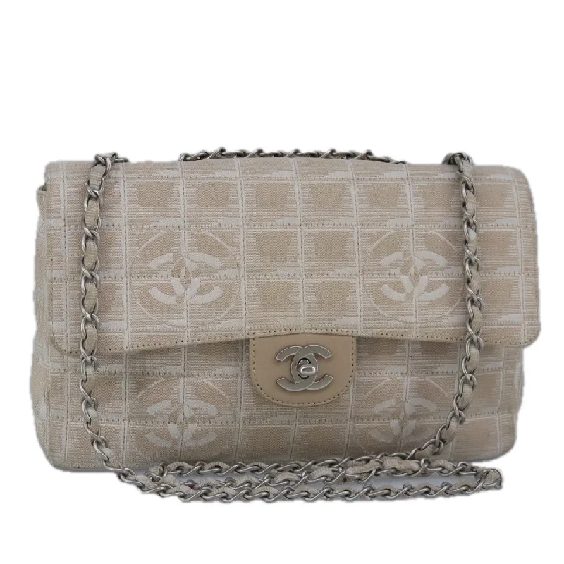 Handle bags with playful pom-poms for charm -Chanel Timeless  Canvas Shoulder Bag (Pre-Owned)