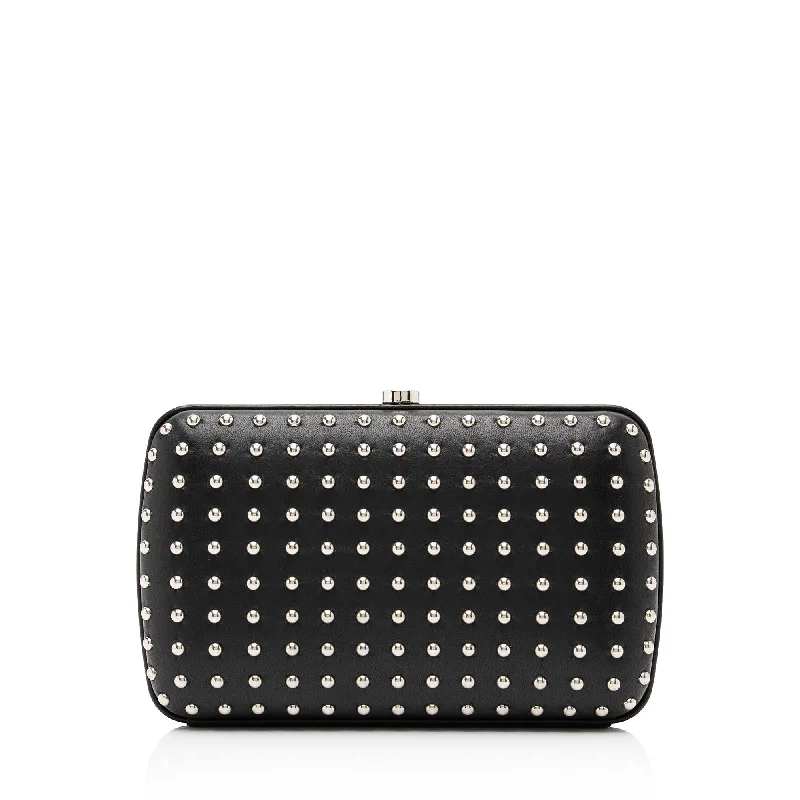 Handle bags with abstract art for uniqueness -Gucci Leather Studded Broadway Clutch