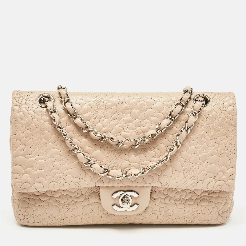 Handle bags with playful patterns for fun -Chanel Beige Leather Medium Camellia Embossed Double Flap Flap Bag