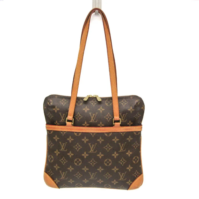 Handle bags with sturdy canvas for longevity -Louis Vuitton Coussin  Canvas Shoulder Bag (Pre-Owned)