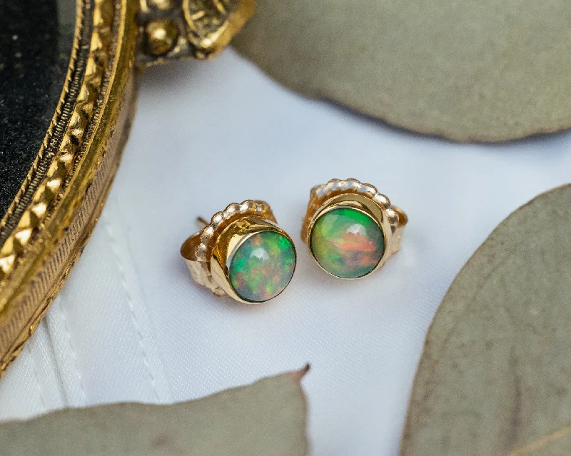 Best hoop earrings with infinity designs for a timeless and meaningful symbol-STUD BEZEL SET ETHIOPIAN OPAL EARRINGS IN 14K YELLOW GOLD