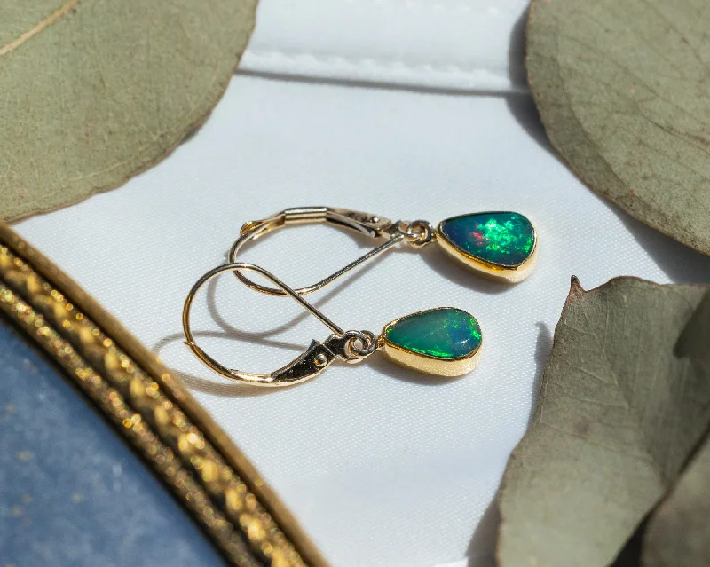 Hoop earrings with pearl accents for a chic and classic style-TEARDROP BEZEL SET ETHIOPIAN OPAL EARRINGS IN 14K YELLOW GOLD