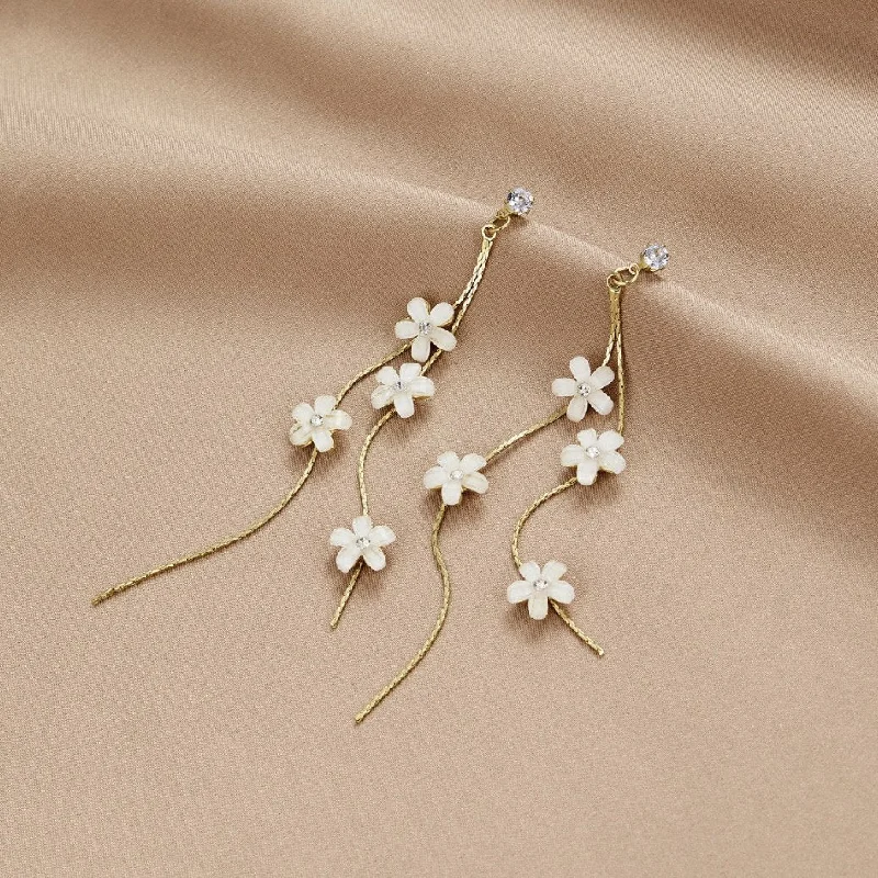 Best hoop earrings with butterfly motifs for a playful and whimsical appearance-White Blossom Tassel Earrings